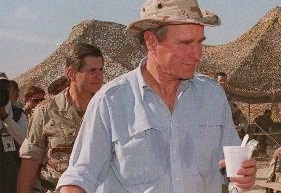 PRESIDENT BUSH VISITS TROOPS THANKSGIVING