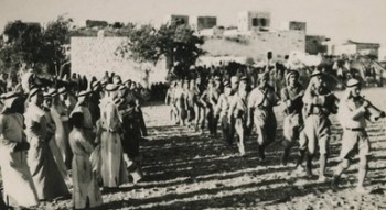 1936-1938 - Palestinian fighters parading in front of villagers 01
